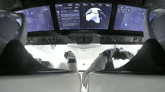 Four people from four different nations ride SpaceX rocket into orbit 8 This camera view from SpaceX's live launch broadcast shows the Crew Dragon spacecraft's touchscreen displays, over the shoulders of commander Jasmin Moghbeli and pilot Andreas Mogensen.