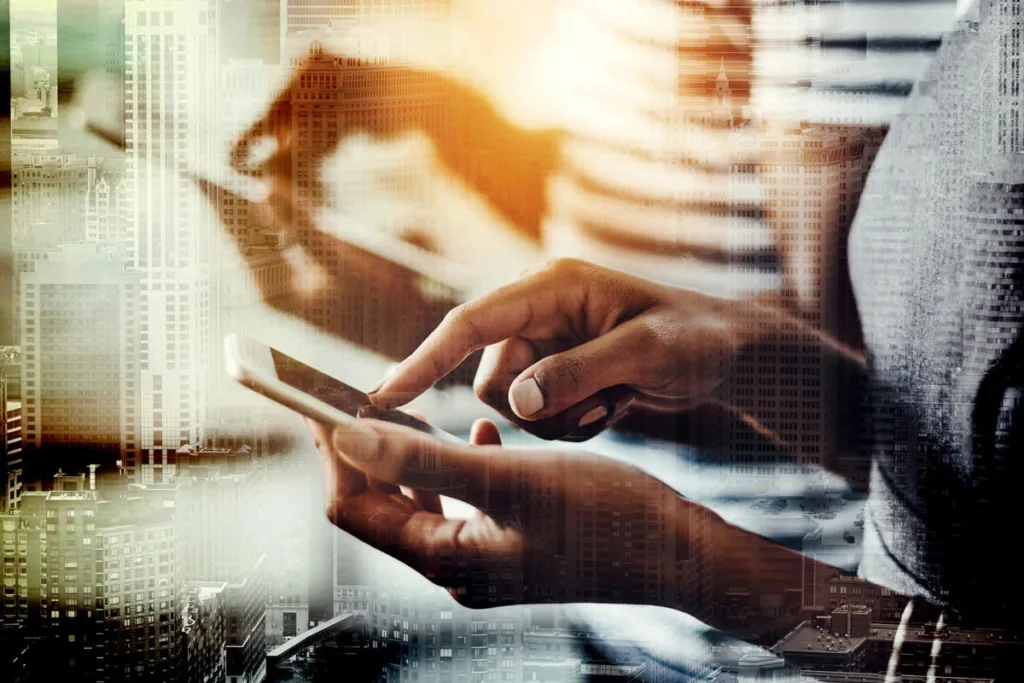 mobile computing devices connectivity mobile management byod office double exposure cityscape by peopleimages gettyimages 1132782491 2400x1600 100802395 large.3x2
